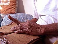 Ustad Rahim Fahimuddin Dagar Reading Manuscript